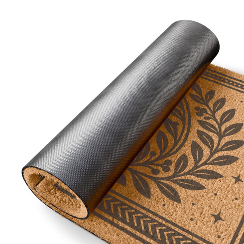 A rectangular natural coir doormat with a durable, non-slip black vinyl backing. The surface features an intricate black gothic-style design centered around an eight-pointed celestial star. This mystical symbol is encircled by a pointed arch formed from two botanical laurel branches, symbolizing wisdom and protection. The central motif is framed by a double border with geometric details and smaller stars. A perfect piece of spiritual home decor for a pagan or mystical entryway.