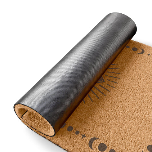Rectangular coir doormat with central evil eye symbol surrounded by lunar phases, in natural tan with black designs.