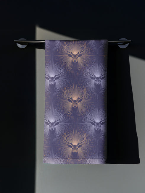 Set of four slate blue dining napkins featuring alternating gold and silver ravens in flight with botanical accents, sized 18x18 inches.