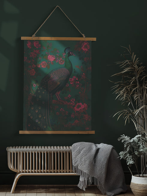 A wall tapestry featuring a detailed teal peacock with golden accents and intricate plumage, surrounded by ornate golden flowers and foliage on an emerald green background, mounted between wooden dowels with twine.