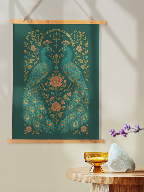 Vertical tapestry wall art measuring 26"x36" featuring two peacocks surrounded by floral vines in gold and teal on a deep green background. Includes a wooden top and bottom hanger with twine for easy wall mounting. Made of smooth polyester with a soft sheen and vibrant print. Ideal for gothic, botanical, or whimsical decor themes.