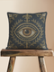 A square woven tapestry pillow in charcoal grey and metallic gold thread, embodying a premium, artisan feel. The central design features a realistic, all-seeing evil eye, a nod to mystical home decor, encircled by ornate Victorian botanical flourishes. This combination of protective symbolism and dark naturalism elements is ideal for Whimsigoth, Gothic, and Dark Academia aesthetics. The luxurious, double-sided piece of functional art is perfect as a statement pillow.
