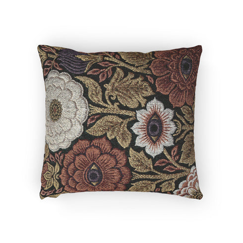 A square woven throw pillow featuring a surreal botanical design on a solid black background. The tapestry-style fabric showcases large, detailed flowers in shades of rust red, cream, and olive green. Nestled within the center of each prominent blossom is a detailed, human-like eye with a dark plum iris, creating a striking evil eye motif. The interwoven threads give the pillow a rich, textured appearance. The pillow is fully stuffed and sewn closed, presenting a smooth, seamless edge.