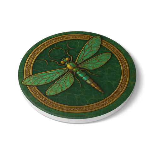 Round ceramic coaster featuring a raised gold-tone dragonfly relief and ornate border on a deep green glazed surface; 4-inch diameter; backed with natural cork for non-slip stability; heat- and cold-resistant; easy-wipe ceramic top; ideal for mystical, botanical, or occult-inspired tabletops.