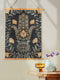 Botanical Hamsa wall tapestry featuring gold and teal design on black background, showing a protective hand symbol adorned with leaf motifs and floral elements, hanging from wooden dowels with natural twine.