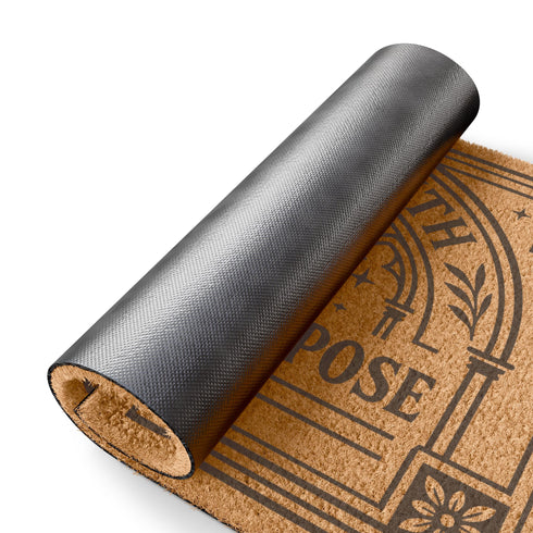 A rectangular eco-friendly coir doormat measuring 24×16 inches, shown on a dark stone entryway. Crafted from natural coconut fiber with a weather-resistant texture to grip dirt. Printed in bold black ink, it features a detailed Christian Gothic design: a central cross within an ornate circle, framed by cathedral arches. The top reads “CROSS WITH,” the bottom “SACRED PURPOSE,” all enclosed by a floral gothic border. Includes a black vinyl non-slip backing.