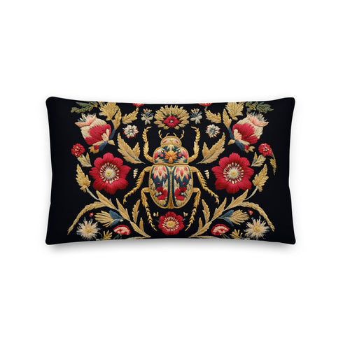A rectangular black lumbar pillow with a premium linen-feel texture. The pillow features a detailed, tapestry-style Art Nouveau print of a large scarab beetle at its center. The beetle and surrounding symmetrical floral and botanical motifs are rendered in rich colors of antique gold, deep crimson red, and muted teal. This ornate, maximalist design is set against a dark charcoal black background, creating a moody, gothic, & scholarly aesthetic suitable for dark academia or victorian home decor.