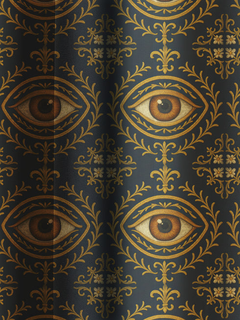 A single panel of a heavyweight blackout curtain with a rich, satiny texture. The design features a repeating pattern of a realistic, all-seeing evil eye, each framed within an ornate, golden Victorian botanical flourish on a dark charcoal background. This mystical art is ideal for Dark Academia, Gothic, and Witchy interior aesthetics, providing both a dramatic statement piece and functional light-blocking for a bedroom, library, or sacred space.