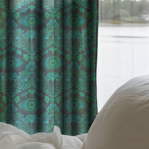 Luminous whispers of emerald sway gently, catching the light like precious jewels suspended in time. Our Guardian Eye Sheer Curtain Panel transforms ordinary windows into portals of protection and refined elegance. Vivid jewel-toned eyes nestled among flourishing botanical motifs create a mesmerizing pattern against the dark background, offering both visual intrigue and symbolic resonance within your sanctuary.
Designed for spaces that demand both statement and subtlety, this panel excels in studies, living