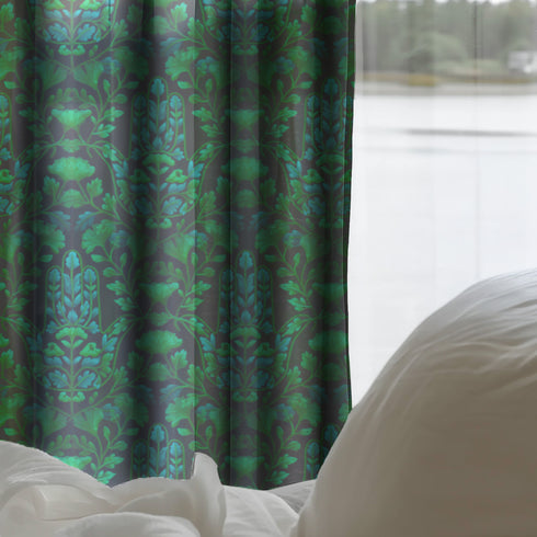 Sheer curtain panel featuring repeating emerald green hamsa hands with blue botanical elements on dark background. Linen-textured polyester fabric filters light beautifully while providing elegant window covering with protective symbolism for bohemian or Victorian interiors.