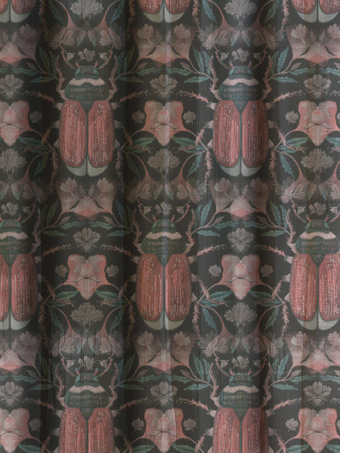 Sheer curtain panel featuring symmetrical pattern of coral-colored scarab beetles with detailed wings, surrounded by pale botanical elements on a dark green/black background. The translucent fabric filters light while displaying entomological motifs in vintage Victorian style.