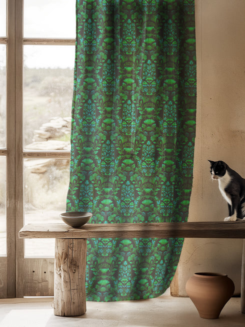 Sheer curtain panel featuring repeating emerald green hamsa hands with blue botanical elements on dark background. Linen-textured polyester fabric filters light beautifully while providing elegant window covering with protective symbolism for bohemian or Victorian interiors.