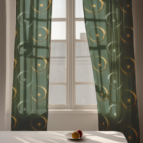 Sheer forest green curtain panel featuring repeating pattern of golden suns and silver moons with radiating lines, creating an elegant celestial motif against translucent fabric.