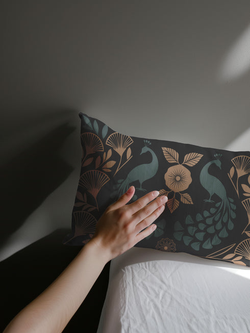 Black pillowcase cover with an Art Deco-style peacock and floral motif in green and muted gold, featuring a symmetrical, vintage design.