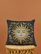 Black woven throw pillow with golden embroidered sun and laurel design, featuring a serene celestial face with closed eyes.
