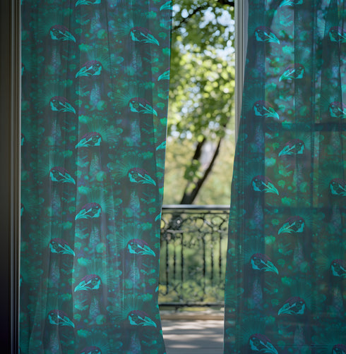 A sheer curtain panel in emerald green featuring a repeating pattern of raven silhouettes and Victorian botanical fan motifs. The fabric has a semi-transparent, linen-like texture.
