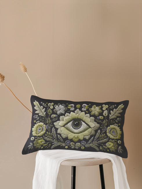 All-seeing eye botanical lumbar pillow with mystical herbal embroidery on dark navy fabric. Gothic cottagecore throw pillow featuring protective third eye symbol surrounded by sage botanicals, oak leaves & wildflowers. Witchy home decor with medieval tapestry aesthetic. Perfect for bohemian spiritual spaces, pagan decor & occult art lovers. 20x12 lumbar size.