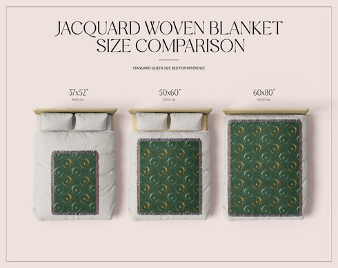 Forest green cotton throw blanket with woven silver moon phases and golden sun motifs, finished with multicolored fringe trim.