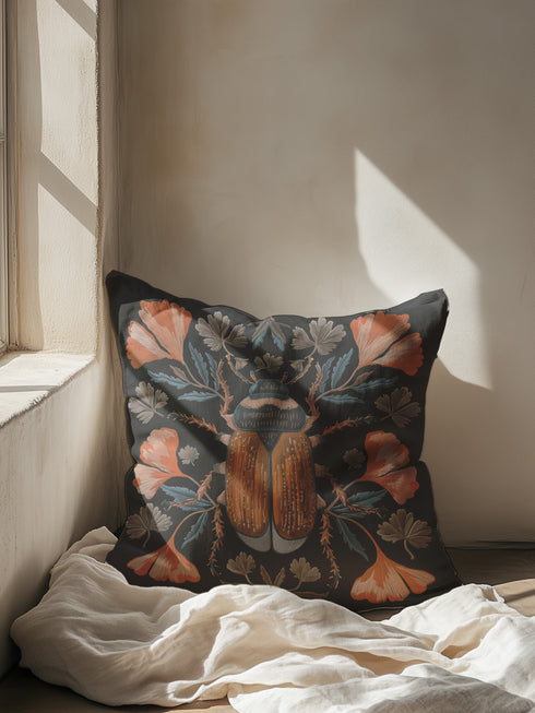 Luxury black pillowcase featuring a detailed scarab beetle with vibrant coral-orange wings and navy thorax, surrounded by symmetrical coral flowers and teal leaves. The intricate entomology illustration shows fine linework with scientific precision against a deep black background.