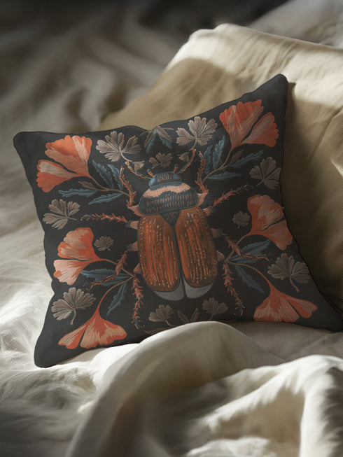 Luxury black pillowcase featuring a detailed scarab beetle with vibrant coral-orange wings and navy thorax, surrounded by symmetrical coral flowers and teal leaves. The intricate entomology illustration shows fine linework with scientific precision against a deep black background.