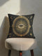 Grimoire and Goblet All-Seeing Eye pillow cover featuring a centralized mystic eye medallion. The design showcases an electric blue pupil with radiating gold and ochre light beams against a deep twilight purple background. The artwork uses a faux embroidery effect, creating a high-fidelity printed illusion of raised texture on smooth polyester linen-feel fabric. A protective evil eye symbol for Dark Academia, Whimsigoth, and celestial gothic home decor. Double-sided square cushion.