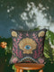 A square decorative pillow cover in a dark charcoal gray with a linen-feel texture. The design features a surrealist, mystical, and nautical goth motif. In the center is a large, golden scallop shell containing a realistic blue and white human eye, serving as an all-seeing eye or protection talisman. The shell is flanked by intricate, embroidered-style pink and red coral branches. The design is bordered by ammonite fossils and smaller seashells, creating dark academia and sea witch aesthetic.