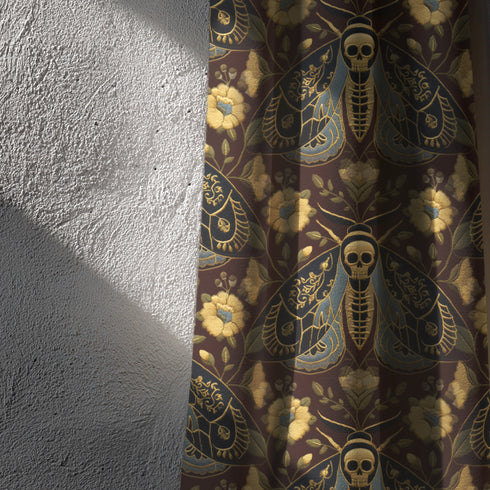 Grimoire and Goblet blackout curtains featuring a repeating Death's Head Moth pattern. The design utilizes a trompe-l'œil effect to mimic raised gold embroidery on a deep espresso brown background. The moths feature skull thoraxes and slate blue wings, surrounded by antique gold peonies and vines in a symmetrical damask layout. The fabric is a smooth, satiny heavyweight polyester with a white reverse side, offering light-blocking functionality.