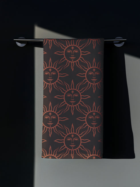 Elegant black cloth napkins with a deep red celestial sun motif, crafted from polyester in a four-piece set, designed for sophisticated dining.