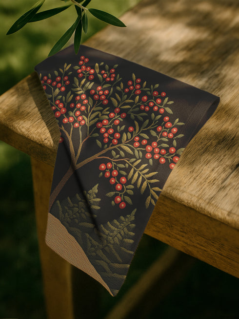 A 4-piece cloth napkin set featuring an embroidered-style illustration of a rowan tree branch with clusters of red berries and green leaves on a deep black background. Each napkin is square-shaped, made from soft polyester with a single-sided print and white reverse, perfect for mystical or autumn dining.
