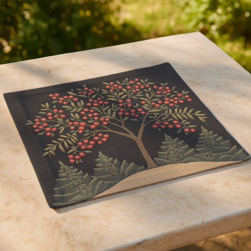 A 4-piece cloth napkin set featuring an embroidered-style illustration of a rowan tree branch with clusters of red berries and green leaves on a deep black background. Each napkin is square-shaped, made from soft polyester with a single-sided print and white reverse, perfect for mystical or autumn dining.
