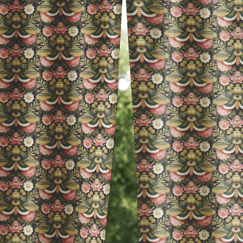 Blackout curtain panel featuring mystical moth pattern with all-seeing eyes, crescent moons, and botanical florals in olive green, cream, rose on dark background. Heavyweight polyester fabric with rich satiny texture, rod pocket construction, gothic home decor, witchy aesthetic, occult symbolism, apothecary style window treatment for bedroom or living room