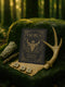 A 5x7 inch Taurus zodiac greeting card featuring a gold-embossed bull with celestial and botanical motifs on a black background. The card reads “Stillness & Power” and includes an interior ritual written for Taurus energy, printed on silky 120lb card stock. Comes with a matching white envelope. Ideal for Taurus birthdays, astrology gifts, and grounding moon rituals. Card is styled with candles, crystals, and nature-inspired props in soft, mystical lighting.