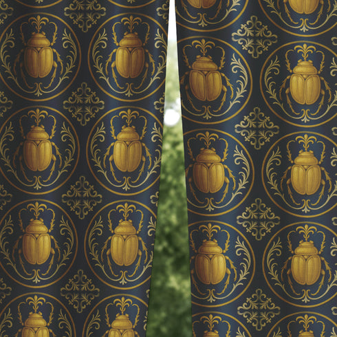 A single panel of a heavyweight blackout curtain with a rich, satiny texture. The design features a repeating pattern of ornate, golden scarab beetles, each framed within a Victorian-style botanical circle on a dark charcoal background. This moody entomology art is ideal for Dark Academia, Gothic, and Maximalist interior aesthetics, providing both a dramatic statement piece and functional light-blocking for a bedroom, library, or living room.