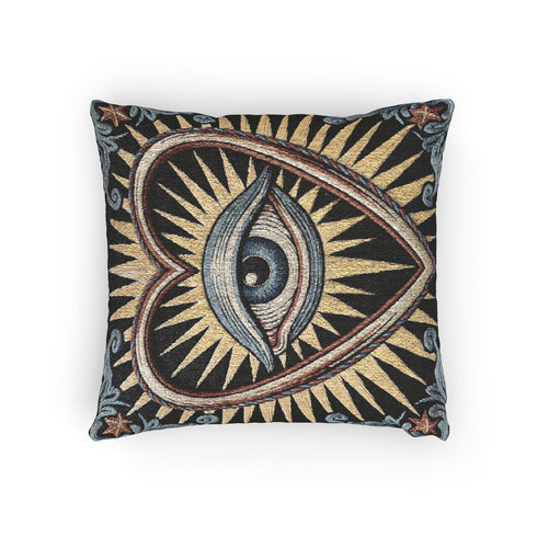 Square 17 by 18 inch jacquard woven throw pillow, woven identically on both faces and closed with a clean finished edge. On a solid black ground, a large blue evil eye sits inside a golden sunburst heart. Gold, pale blue, cream, and rust threads form the design, with dusty blue acanthus leaves curling around the heart and small rust stars in each corner. The design is woven flat into the cotton blend cloth, with visible thread texture and a heavy tapestry hand.