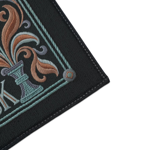 Rectangular doormat with a deep evergreen ground, low loop polyester pile, and black edge trim, printed flat edge to edge to imitate raised embroidery. A central eye with a lavender lid, coral outline, and seafoam iris sits inside a beaded circle under gold sunburst rays. Coral, lavender, and cream folk art tulips rise from seafoam urns on each side. Cream lettering with coral inlines reads SPEAK TRUE OR TURN BACK, framed by a seafoam rope border.
