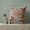 Square 17 by 18 inch jacquard woven throw pillow, woven identically on both faces and closed with a clean finished edge. A mirror symmetrical dragonfly fills the center of a sage green ground, its four long wings outlined in rust copper and filled with apricot and mustard, barred in slate blue along the leading edge. Plum peonies with ochre centers sit in each corner, and olive leaf sprays rise from the base. The ground has a soft sheen and the motif shows matte woven thread.